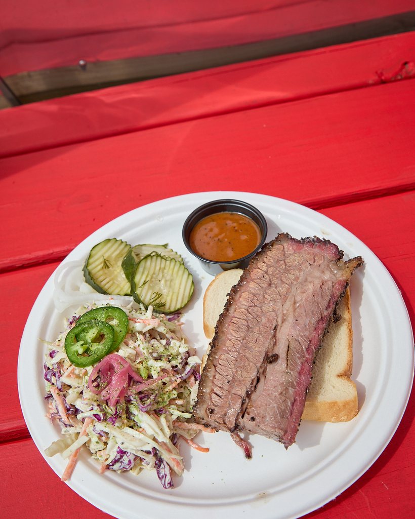 The Blue Collar Combo plate with smoked meat, a side and a drink